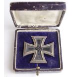 German Nazi Iron Cross 1st Class, maker marked to pin. Case with attempted removal of insignia