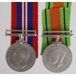 WW2 pair of medals - War & Defence, in original box, with Medal slips to 930190 Cpl. H.E. Gigney,