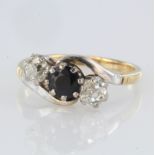 18ct yellow and white gold sapphire and diamond three stone crossover design ring, total diamond