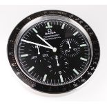 Advertising Wall Clock. Black & chrome 'Omega' advertising wall clock, black dial reads "Omega