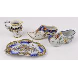 Four French pieces, circa mid to late 19th Century, comprising two shoes (clogs), a small jug &