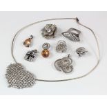 Mixed lot of silver jewellery to include a silver necklace, three pendants, a brooch and a pendant
