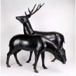 Two large spelter figures of deer, largest height 84cm, length 65cm approx. (heavy, buyer collects)