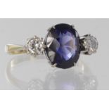 18ct yellow gold three stone ring set with fine colour oval sapphire measuring approx. 10 x 8mm,