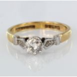 18ct yellow gold and platinum diamond solitaire ring with diamond set shoulders, principal diamond