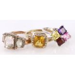 Three 9ct dress rings to include a rose gold quartz ring, a yellow gold citrine ring and a white