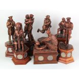 Danbury Mint. A collection of seven figures, by the Danbury Mint depicting Soldiers, Airman &