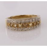 9ct yellow gold ring set with a central row of champagne coloured diamonds bordered either side by