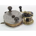 Two fishing reels, comprising a large reel by A. Carter (5 3/4 inch), engraved 'A. Carter & Co.