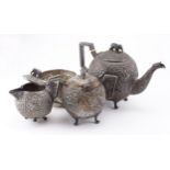 Indian white metal three piece tea set & bowl, teapot size height 16cm, length 24cm approx.