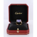 18ct Cartier ring set with an oval blue chalcedony cabochon in a four claw mount, finger size O,