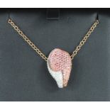 18ct rose gold pendant and chain set with 1.80ct pink sapphire and 0.46ct diamonds in a pave