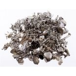 Ten Silver / white metal charm bracelets with a good selection of charms. Total weight over 400g