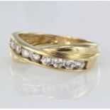 9ct yellow gold band ring with channel set cz, finger size M, weight 2.7g