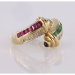 14ct yellow gold crossover ring set with diamonds, princess cut emeralds and rubies and sapphire