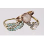Three 9ct multi gemstone dress rings to include a blue topaz band ring, a rose gold quartz ring, and