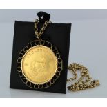South Africa 1oz Krugerrand on a 22" 9ct chain with mount. Total weight 51.5g