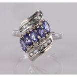 9ct white gold tanzanite and diamond dress ring, finger size K, weight 2.5g