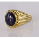 18ct yellow gold signet ring set with single oval cabochon, finger size P, weight 7.1g