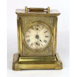 German brass musical alarm clock, dial reads 'J.U.F.', height 15.5cm approx.