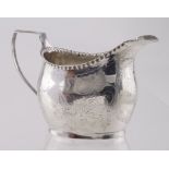 George IV silver, bright-cut engraved cream jug, maker probably W.M. Barber, London, 1829, the