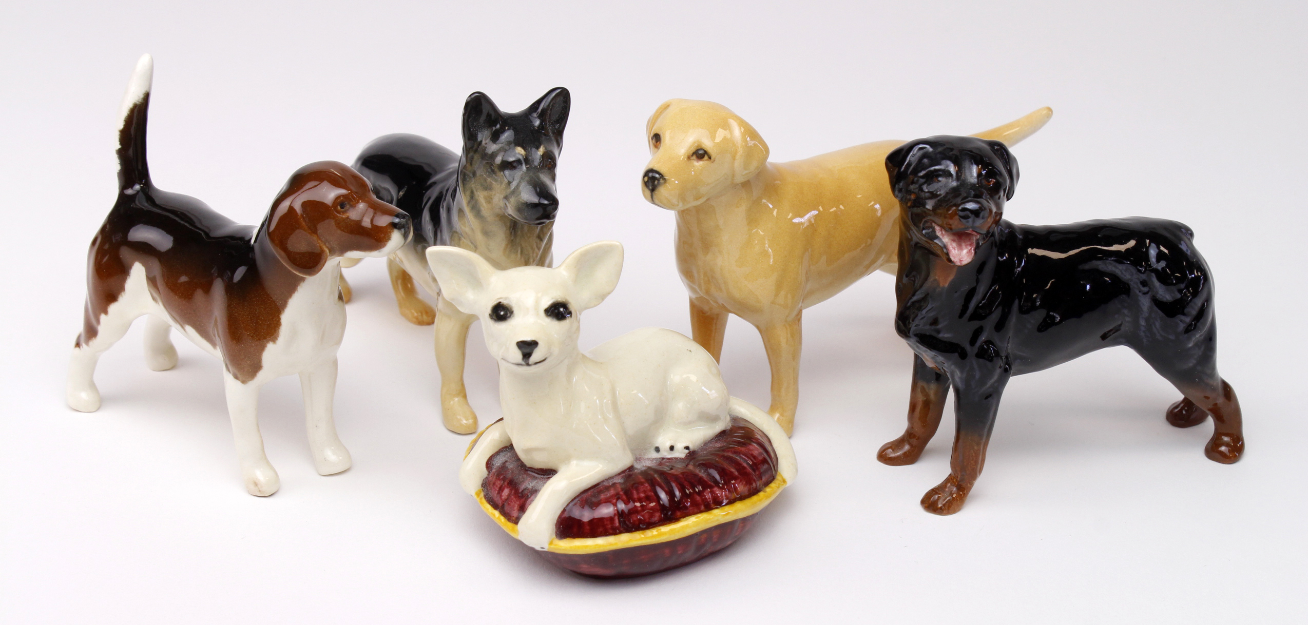 Beswick. A collection of five beswick dogs, including Chihuahua, German Shepherd, Rottweiler,