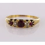 18ct yellow gold ruby and diamond graduated five stone ring, finger size L, weight 2.5g