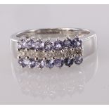 9ct white gold tanzanite and diamond three row band ring, finger size L, weight 3.2g