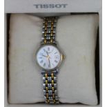 Ladies Tissot bi colour bracelet wrist watch with white dial and Roman numerals, box and papers.