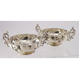 Two late Victorian twin handled sweet dishes . Hallmarked London 1899 by Carrington & Co (John