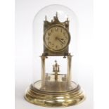 Brass anniversary clock, beneath a glass dome, total height 28cm approx.