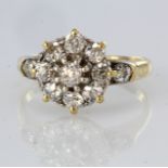 18ct yellow gold diamond cluster ring set with nine round old cut diamonds and a further diamond