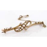 Yellow Metal tests 9ct Gold Bar Brooch set with Seed Pearls and Diamonds, with safety chain weight