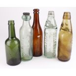 Mixed lot of five old glass bottles, including two "L.M.S. Hotels" beer bottles, one "Huntingdon