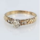 9ct yellow gold diamond solitaire ring with channel diamond set shoulders, principal diamond