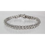 18ct white gold diamond set line bracelet, 2ct total diamond weight. Length 18cm, weight 14.0g
