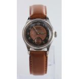 Gents Tissot Antimagnetique manual wind wristwatch,. The bi-colour dial with arabic numerals and