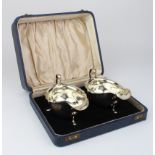 Boxed set of two silver sauce boats. Hallmarked Sheffield 1936 by Viner's Ltd (Emile Viner).