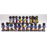Robertsons. A collection of twenty-one Robertson Golly figures, comprising footballers & band
