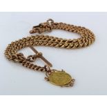 9ct "T" Bar pocket watch chain with an Edward VII Half Sovereign dated 1910 attached . Length approx