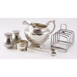Mixed silver to include mlk jug, toast rack, tongs etc. Total weight approx 15.5oz