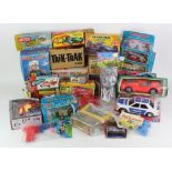 Toys. A collection of original and reproduction boxed toys, including Marx, Spot On, Triang, etc. (