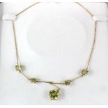 9ct yellow gold Y shaped necklace set with five Lime Citrine stones and a diamond accent, weight