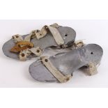 Zepplin interest. A pair of unusual childs shoes made from airship metal (Duralumin), both stamped
