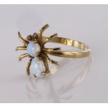 9ct yellow gold spider ring set with two opal cabochon stones and diamond eyes, finger size O,