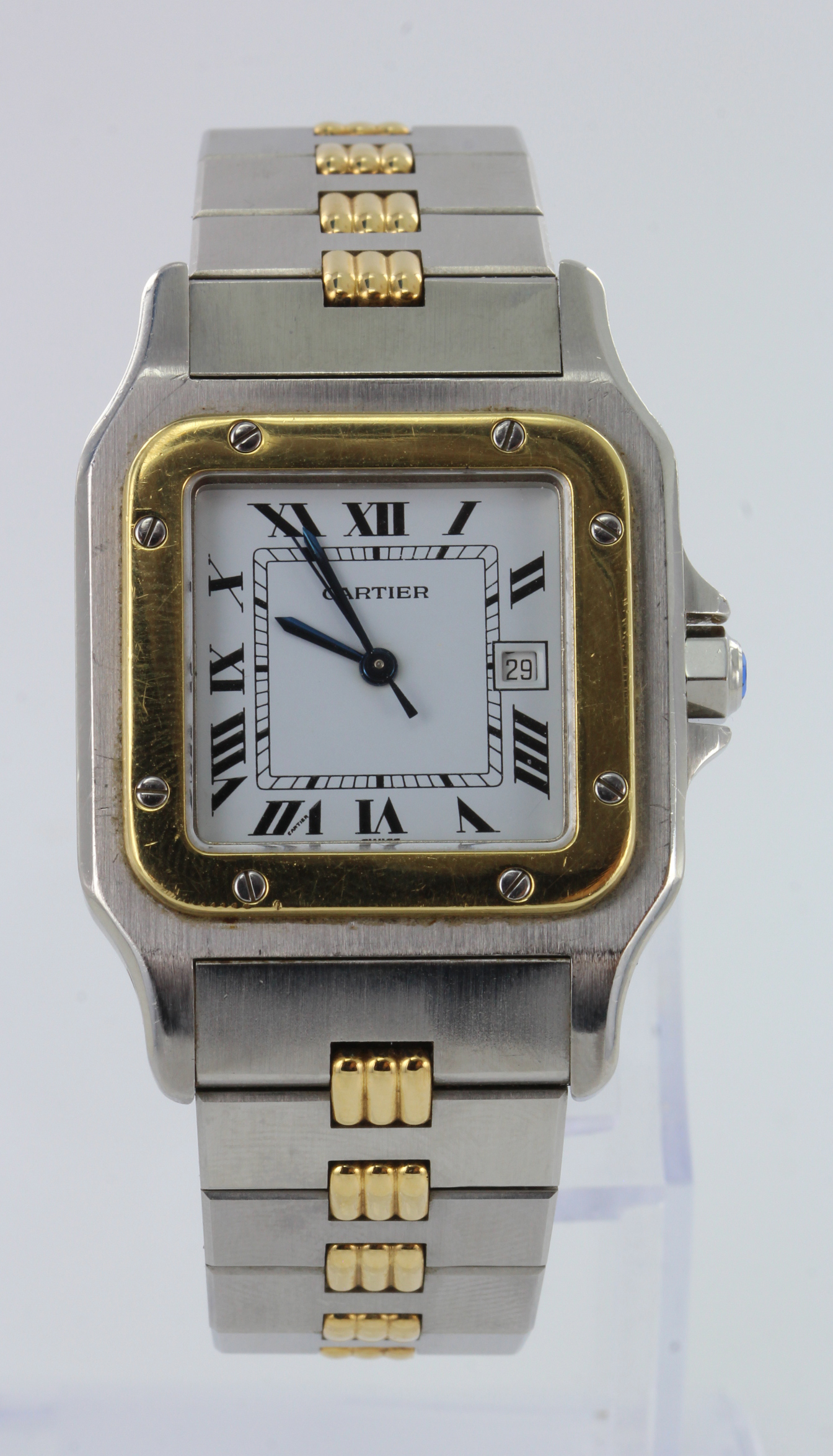 Cartier "Santos De Cartier" Tank automatic wristwatch. On a bi-metallic Cartier bracelet. Numbered