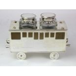 Silver plated inkwell stand in the form of a Railway carriage, made by Franz Reichenberg, Berlin D.