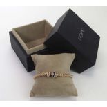 18ct 'Flex-it' bracelet by Fope. Approx 19.3g. In its original box