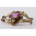 9ct yellow gold brooch set with single oval pink stone, weight 3.2g
