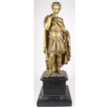 Large gilt metal statue depicting a Roman soldier, on a wooden plinth, circa early to mid 20th